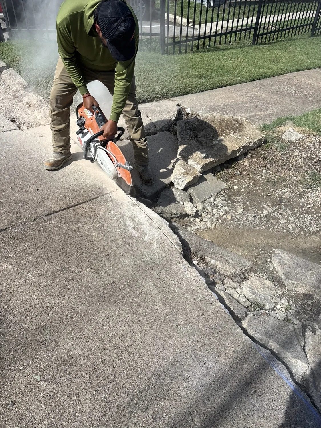 Sidewalk and ramp replacement in progress